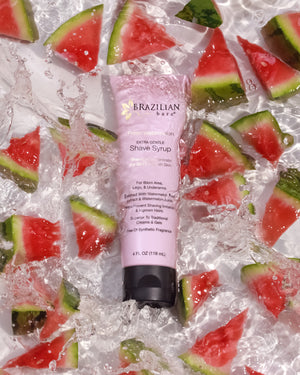 Brazilian Bare Watermelon Shave Syrup splashing in water with watermelon slices